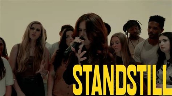 Lyrics & Translations of Stand Still by The Walls Group
